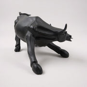 Sleek Black Charging Bull Statue