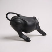 Sleek Black Charging Bull Statue